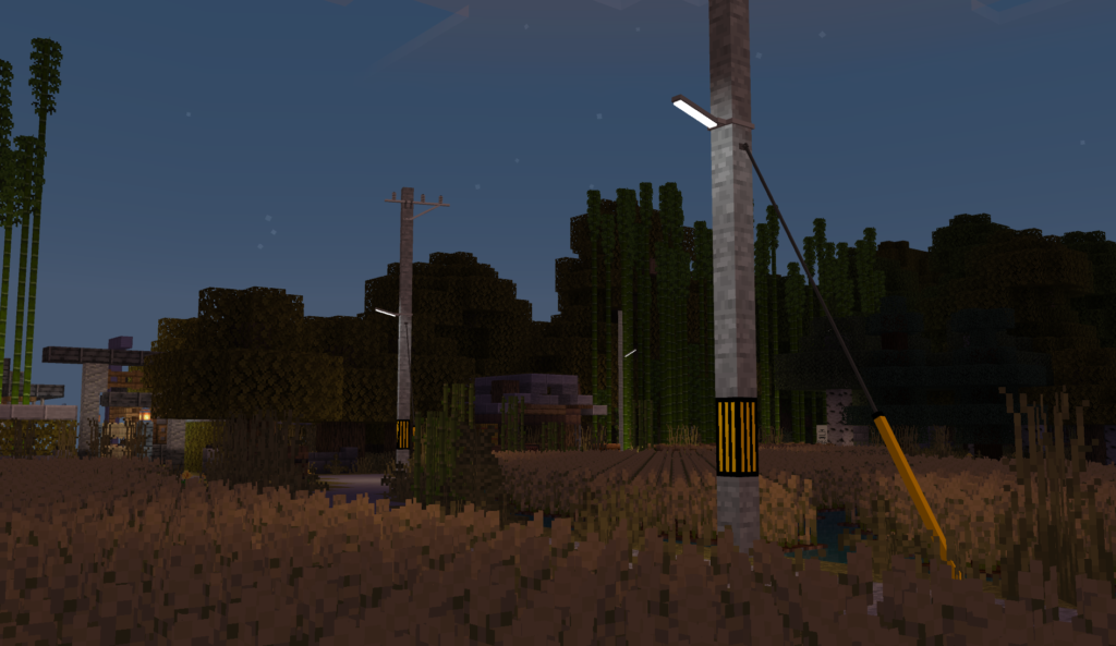 街灯付きの電柱がマイクラの夜の畑を照らし出しいる。